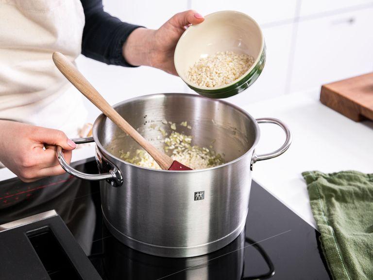 Peel and finely dice onions and remaining garlic. Heat remaining olive oil in a large pot over medium heat and sauté onion for approx. 1 min. Add garlic and sauté for approx. 2 min. more. Add risotto rice and cook for approx. 1 min., stirring to coat.
