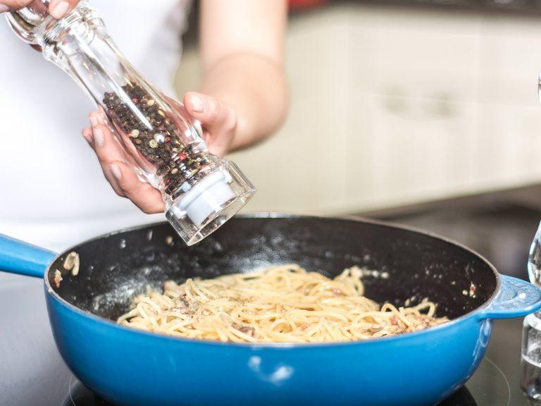 Toss spaghetti in the sauce. Add Parmesan, toss again, and season with salt and pepper to taste before serving.