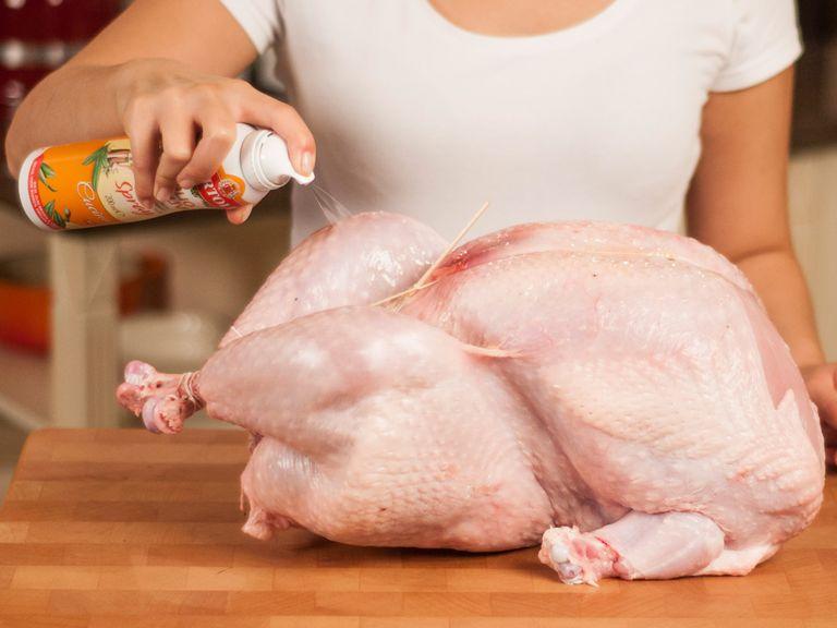Generously rub the turkey with olive oil.