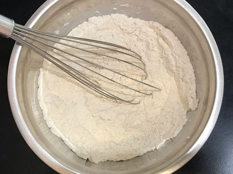 In a separate medium bowl, whisk together the flour, baking powder, baking soda and salt.