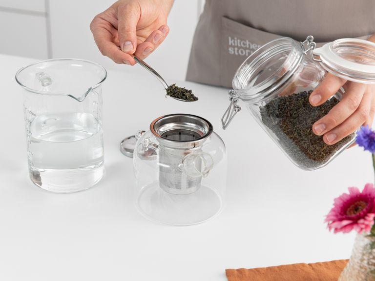 Add loose green tea to a tea pot. Add just over half the water, transfer to the fridge, and let steep for approx. 2 - 4 hr., depending on the tea and how strong you like it.