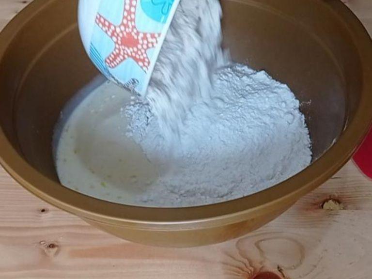 Prepare the dough : In a large bowl, mix together milk, egg and sugar. Mix well with the whiskAdd the flour, salt and instant dry yeast, mix well with spatula until you get the dough form.Cover the bowl with kitchen towel and let it rest for 20 minutes.