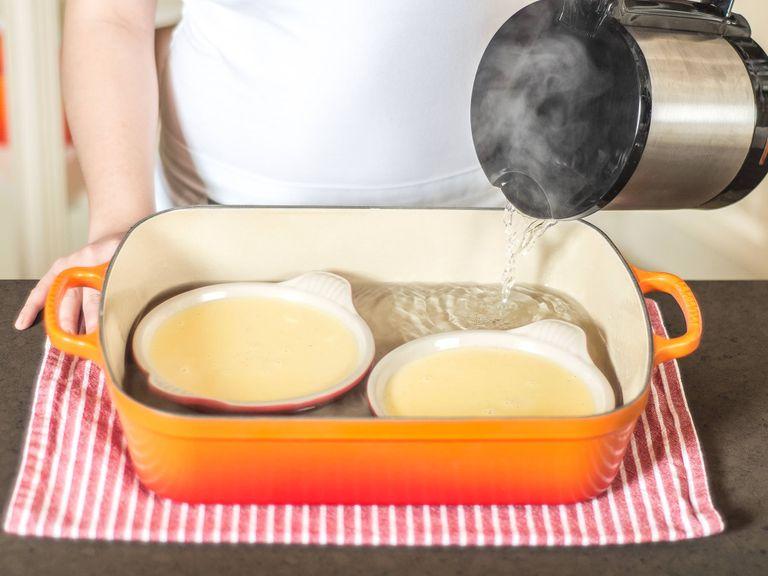 Pour the mixture into brûlée tins and place these into a tall baking dish. Pour hot water into the baking dish, creating a water bath in which to cook the crème brûlée.