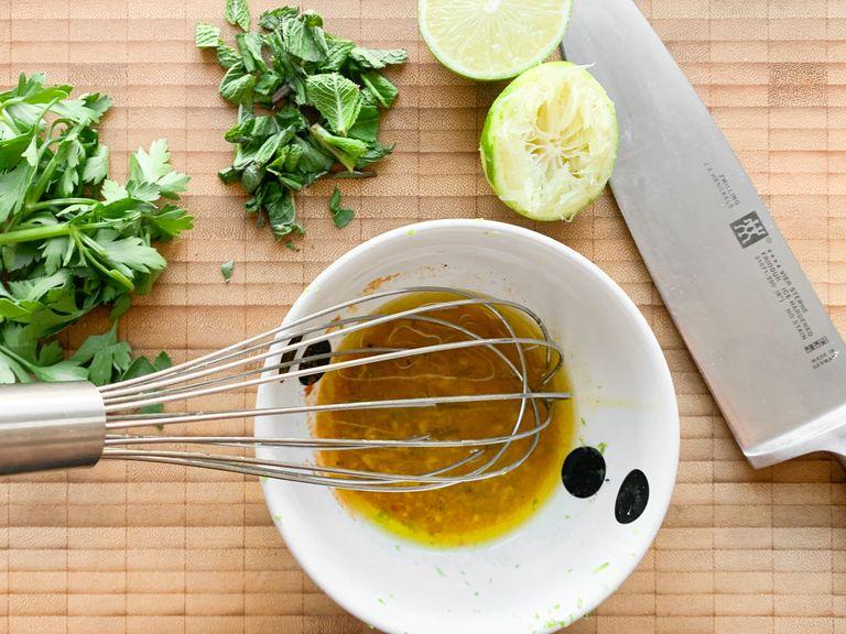 In a bowl, mix together the mustard, honey, olive oil, apple cider vinegar, ground coriander, cayenne pepper, and the juice and zest from the lime.