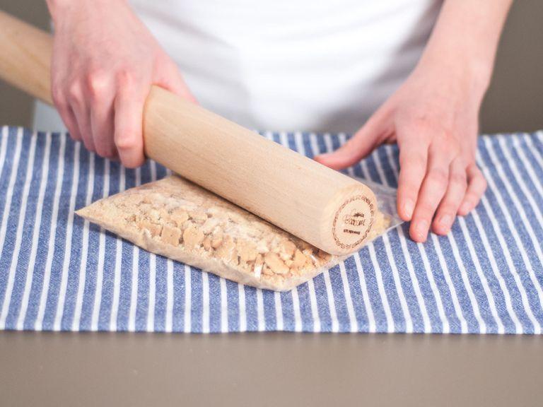 Place cookies into a freezer bag. Tightly seal and crush cookies with a rolling pin.