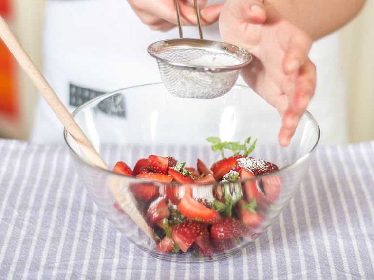 Mix strawberries and mint with some of the confectioner's sugar and leave to one side. The sugar gives the strawberries a lovely shine.