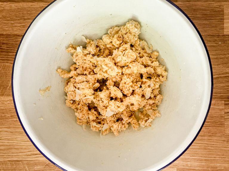 Add room temperature butter, flour, remaining sugar, brown sugar, coconut, salt, ground ginger, and vanilla extract to a bowl and use your hands to combine everything into a chunky crumble topping. Transfer fruit filling to blind-baked, cooled crust. Top with the crumble and bake at 375°F/190°C for approx. 1 hr., or until the juices are bubbling up through the well-browned crumble. Let cool completely before slicing and serving with vanilla ice cream. Enjoy!