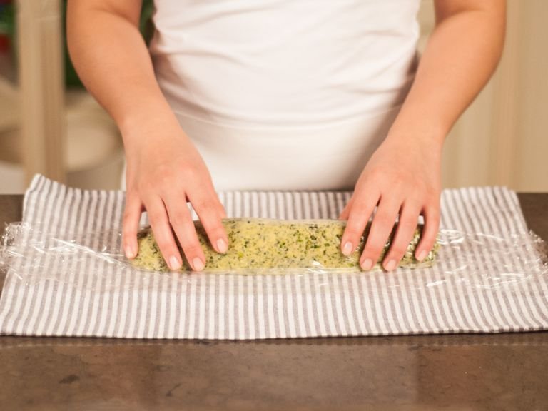 Place pistachio mixture onto a large piece of plastic wrap. Form into a cylindrical shape and tightly wrap. Transfer to refrigerator and allow to set.