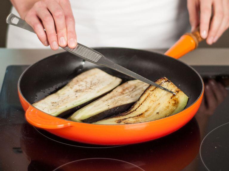 In a frying pan, heat up some olive oil over medium heat. Sauté eggplant for approx. 2 – 3 min. per side. Set aside.