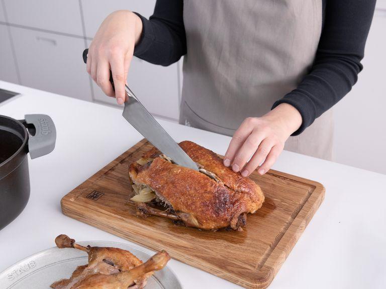 To remove the breasts, cut along the backbone from front to back, and remove one breast at a time. Slice along the front of the breast to loosen it from the roast. It should come off rather easily.
