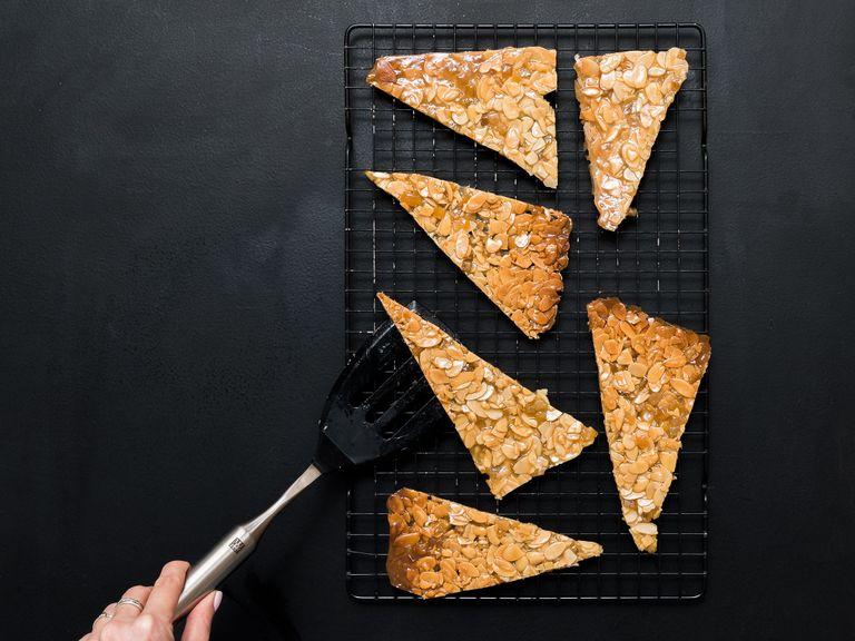 Let cool for 10 min. Cut warm mass into approx. 6x6-cm/ 2.5x2.5- in. squares, then halve the squares diagonally. Alternatively break into desired size. For round Florentines, cut out with a round cookie cutter. Allow to cool completely.