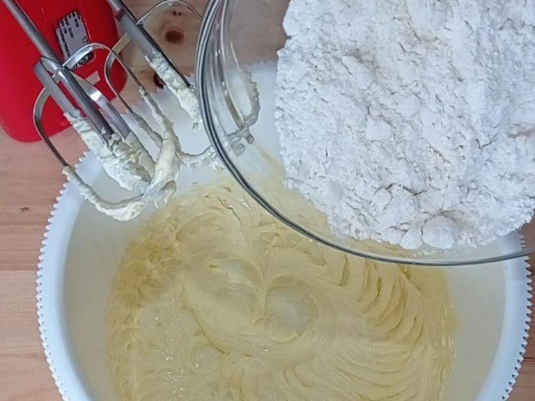 In a medium bowl, mix together butter and sugar until light and fluffy. Add in the flour and mix until well combined.