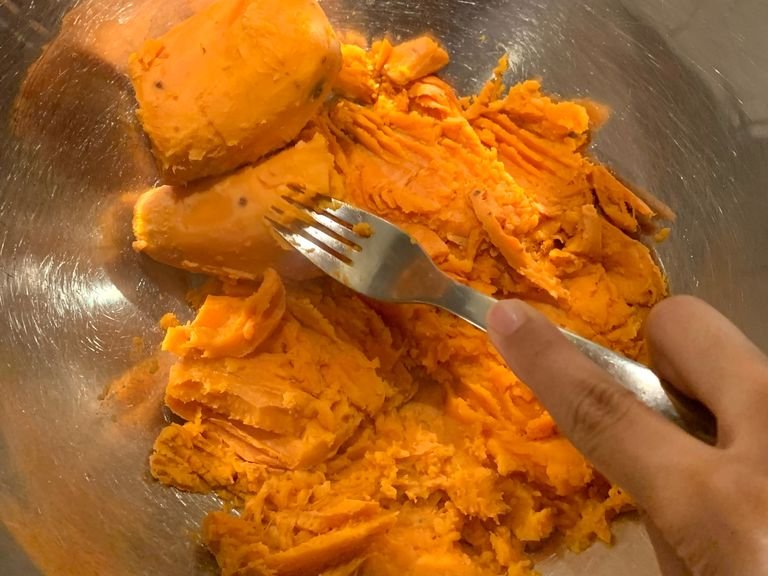 Smash the sweet potatoes in a large bowl.