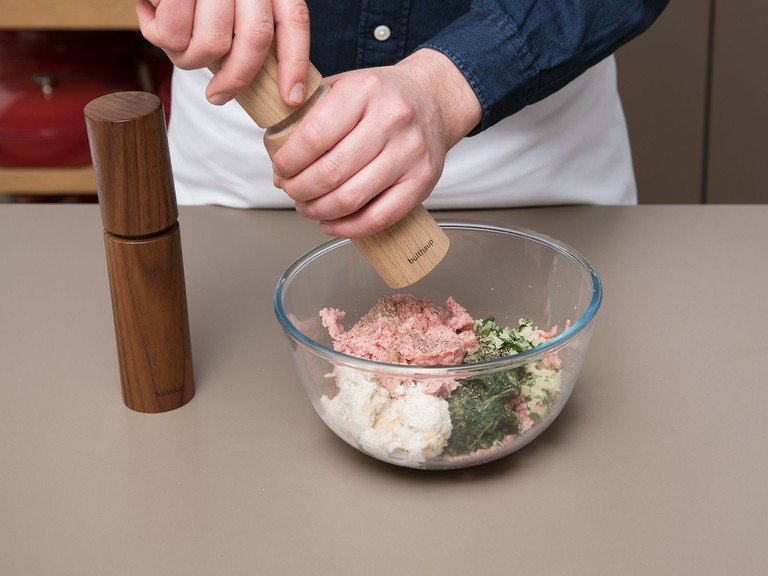 Add two thirds of the ground pork, drained spinach, egg, sautéed onion and parsley, and bread roll to a bowl. Grate nutmeg over to taste. Add the remaining ground pork and cream to a food processor and process thoroughly. Add to bowl with other meat mixture, season to taste with salt and pepper and mix to combine.