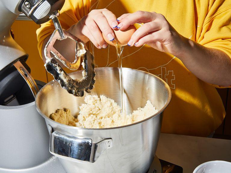 Mix flour, sugar, vanilla sugar, baking powder, and salt in a large bowl. Beat with a hand mixer with dough hooks and gradually add in butter. Once everything is well combined, add the eggs one at a time. Wrap dough in plastic wrap and chill for approx. 1 hr.