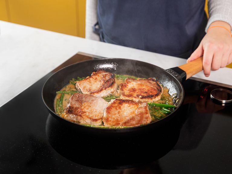 Return pork chops to pan and cook for approx. 3 min. Serve with a salad or crusty bread. Enjoy!