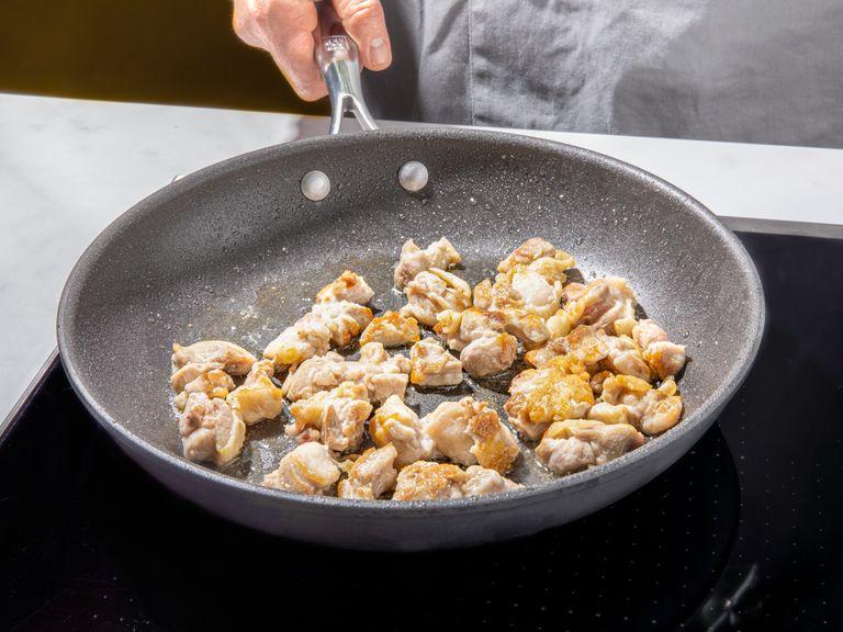 Add some vegetable oil to a frying pan. Fry chicken until crispy and golden brown, approx. 5 - 7 min. Season with salt and pepper. Remove from heat and drain excess oil on a paper towel-lined plate.