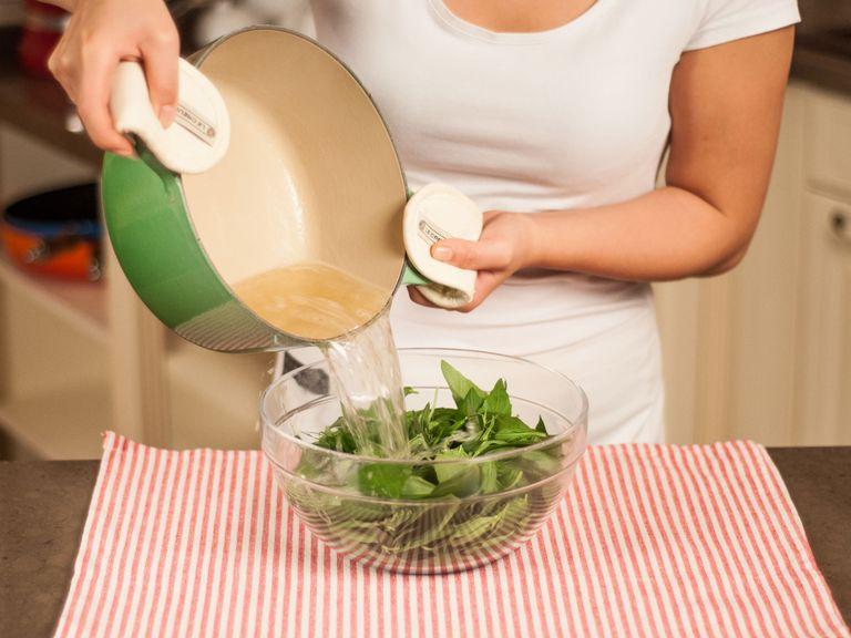 Pick basil and tarragon leaves and place in a large bowl. Douse with boiling sugar water. Then allow to cool.