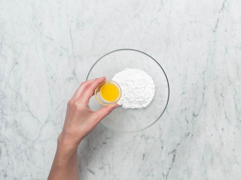 Combine orange juice with powdered sugar to create a glaze.