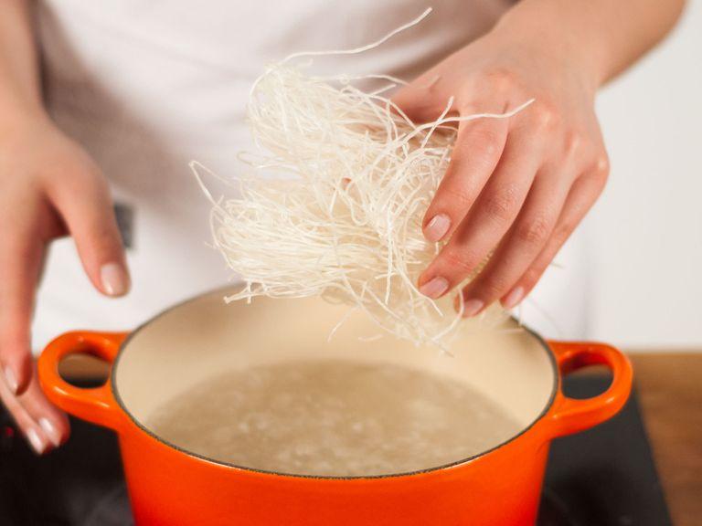 Add water to a small saucepan and bring to a boil. Add glass noodles and cook for approx. 2 - 3 min. Drain and rinse with cold water. Set aside.