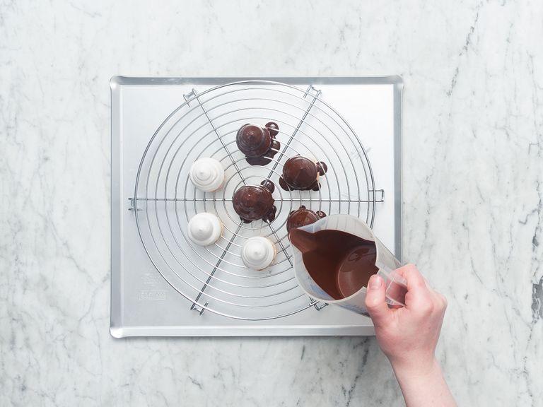 Pour chocolate over meringues carefully until they’re evenly covered. Refrigerate mallomars for approx. 20 min. and enjoy cold!